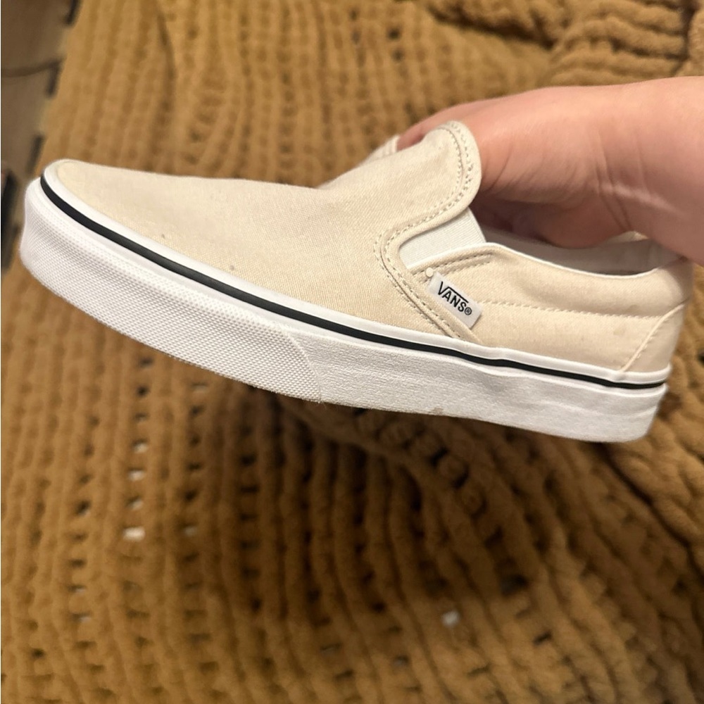 Tan colored slip on vans. Worn only once size 7
